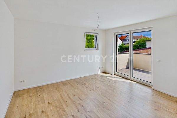 Schlafzimmer mit Zugang zum Balkon