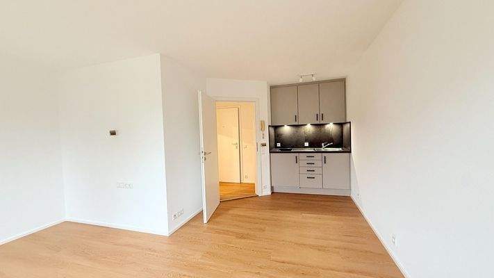 Zimmer mit Einbauküche