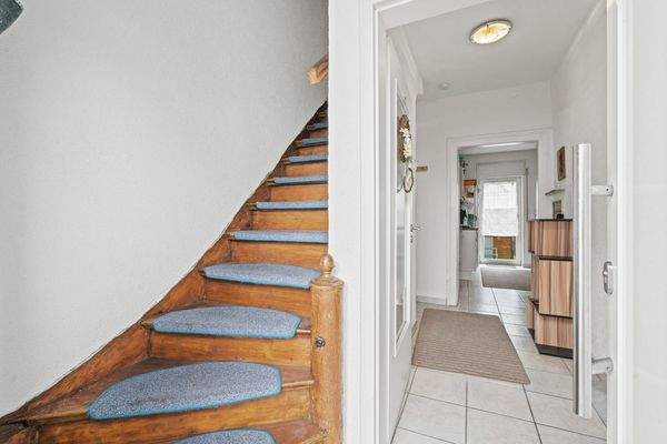 Treppenaufgang ins Obergeschoss 