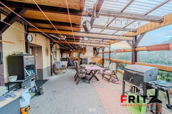 Wintergarten mit Kamin