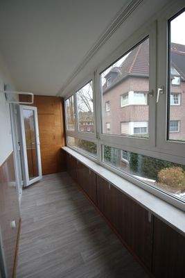 erster verglaster Balkon