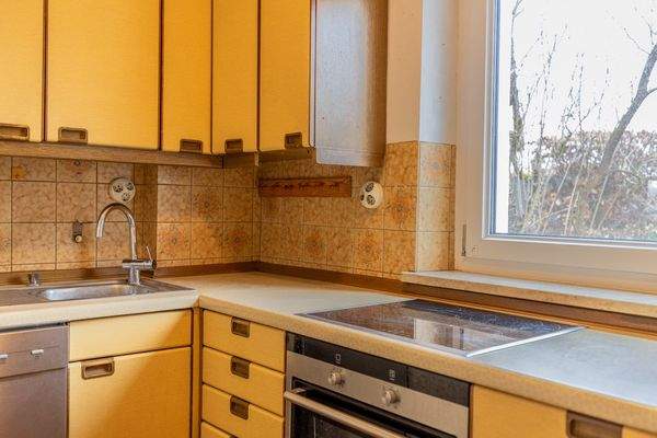 Familienidyll in Bogenhausen: Doppelhaushälfte mit sonnigem Westgarten & Grünblick