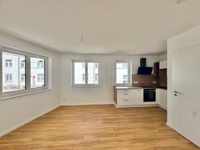 Erstbezug! Geräumige Zweizimmerwohnung unweit vom Stadtzentrum entfernt - Photo 1