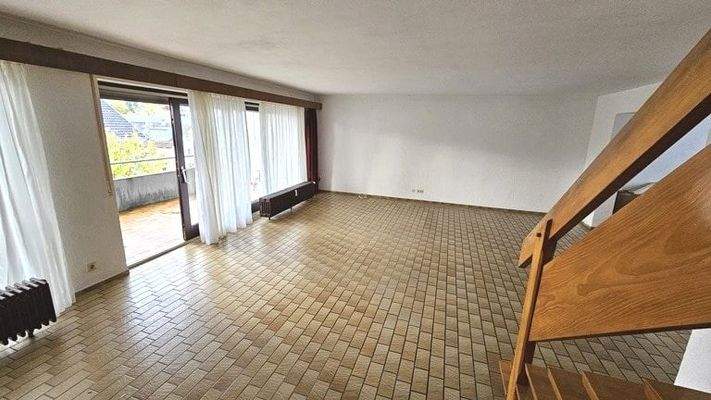 Wohnzimmer im Obergeschoss mit Zugang zum...