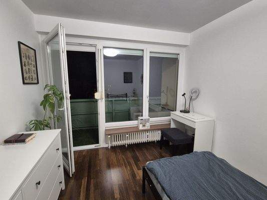 Schlafzimmer mit Balkon