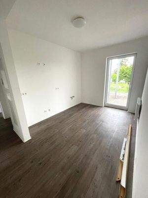 Küche mit Zugang zur Terrasse