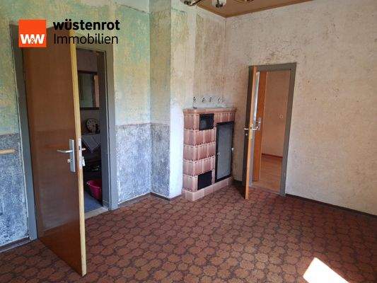 Zimmer mit Kachelofen