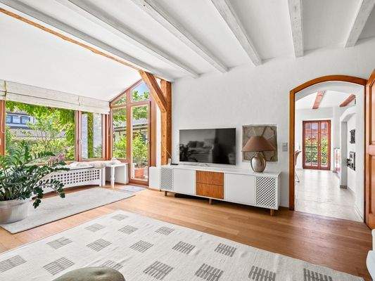 Wohnzimmer mit Durchgang Essbereich