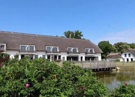 Sonnendeck mit Hausansicht