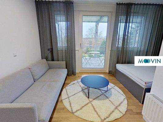 Ansicht IV: Wohn- und Schlafzimmer mit offenem Küchenbereich