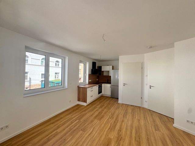 Erstbezug! Geräumige Zweizimmerwohnung unweit vom Stadtzentrum entfernt - Photo 2