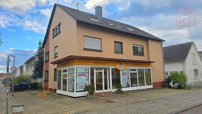 Ladenfront mit Immobilie VP