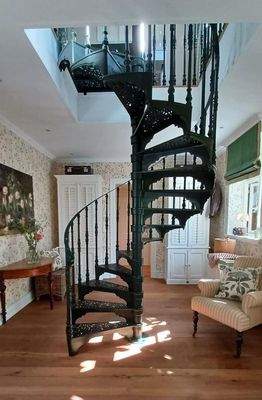 Eisenwendeltreppe in das 1.OG