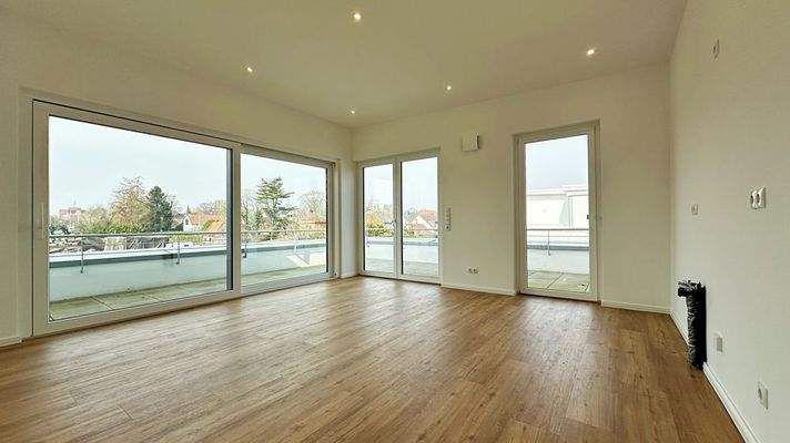 Wohn-/Esszimmer mit Kochbereich