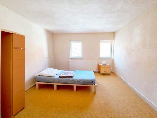 Schlafzimmer mit ökologischem Lehmputz