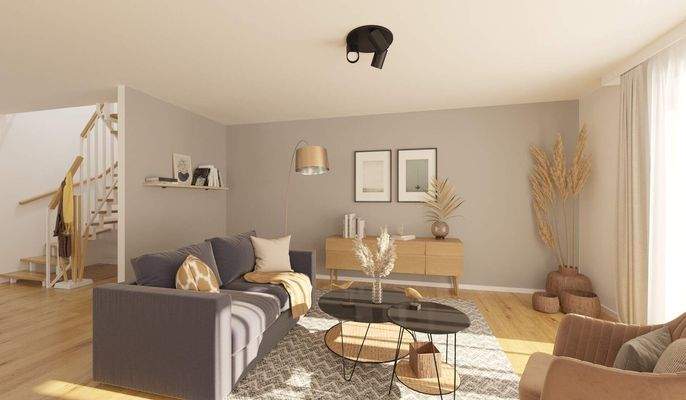 Das Wohnzimmer wird durch bodentiefe Fenster hell 