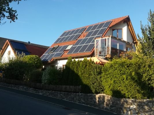 Haus mit Wintergarten auf der Dachterrasse