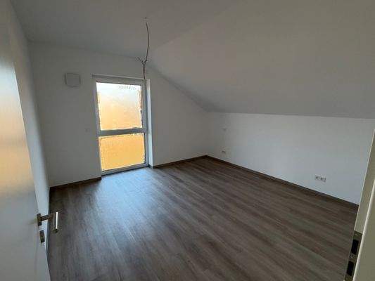 Schlafzimmer DG rechts.jpeg