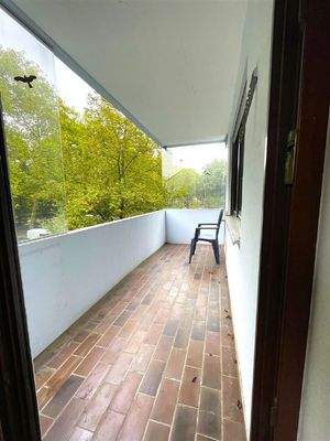 Balkon mit Wetterschutzverglasung