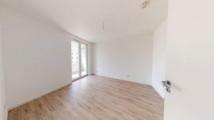 Schlafzimmer mit Zugang zur Terrasse