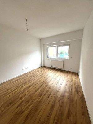 Wohn-/Esszimmer Whg EG