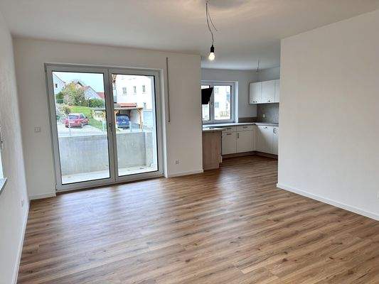 Wohnbereich mit Zugang zur Küche