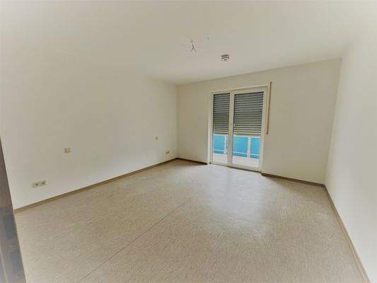 Schlafzimmer mit Ausgang zum Balkon