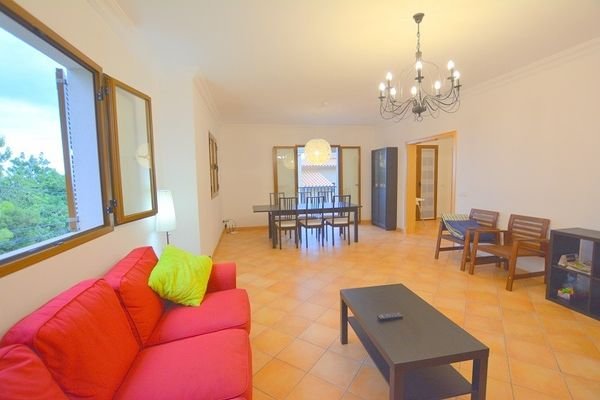 spacious living room with dinner area