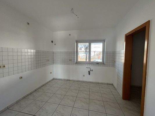 Küche mit Abstellraum