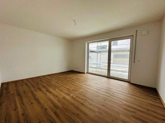 Schlafzimmer mit Zugang zur Terrasse