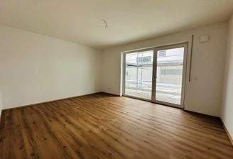 Schlafzimmer mit Zugang zur Terrasse