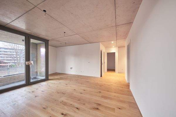 Wohnküche mit Blick zur Küchenzeile - HERDERGÄRTEN 1.2.5