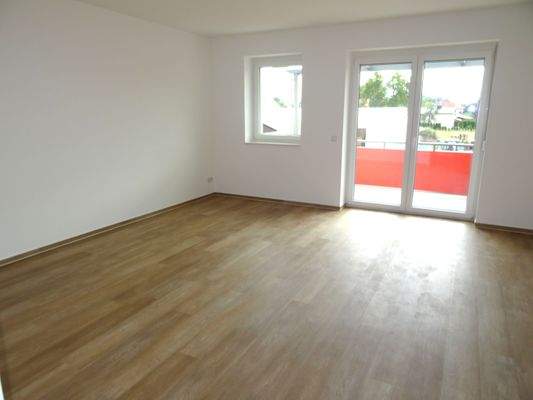 Wohnzimmer mit Balkonzugang