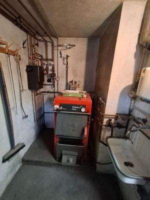 Private zentrale Holzheizung