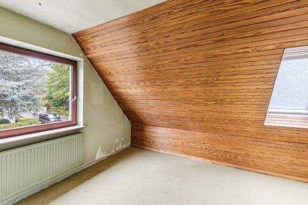 Gemütliches Zimmer im Dachgeschoss