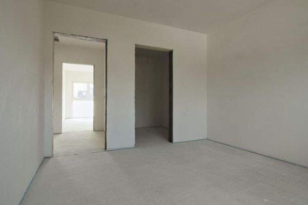 Schlafzimmer mit Ankleidezimmer im Obergeschoss