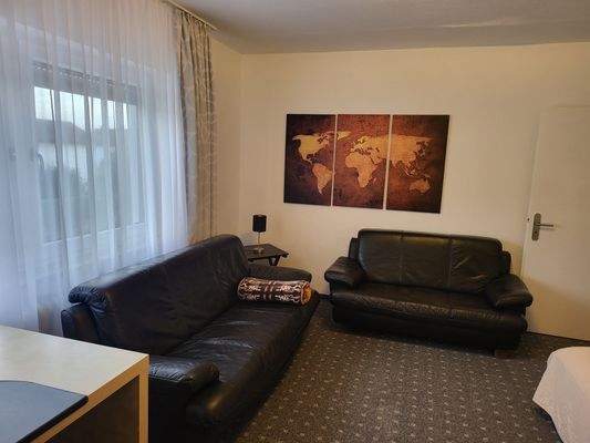 Wohn-Schlafzimmer 1.OG.jpg