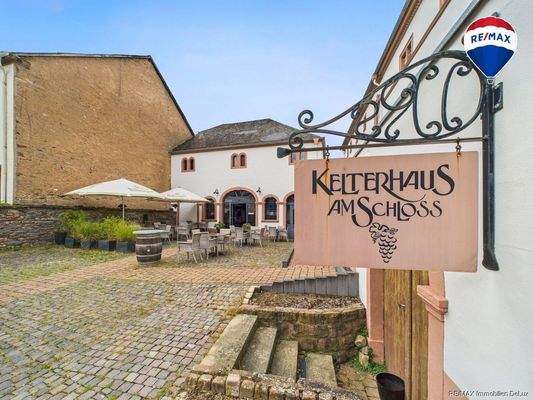 RE/MAX Immobilien DeLux Kelterhaus Gaststätte am Schloss Ayl
