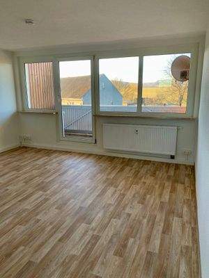 Wohnzimmer mit Balkon