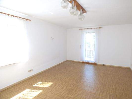 Schlafzimmer mit Zugang zum Balkon