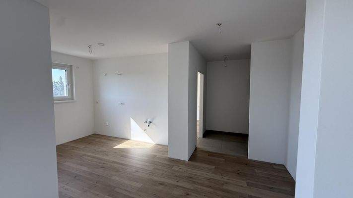 Haus_3_Top_11_Küchenbereich_Persepktive_aus_Wohnbereich