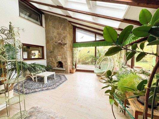 Wintergarten mit Zugang zum Garten