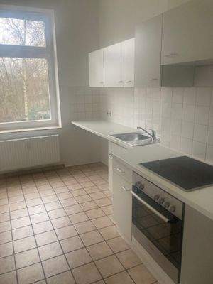 Küche mit Einbauküche