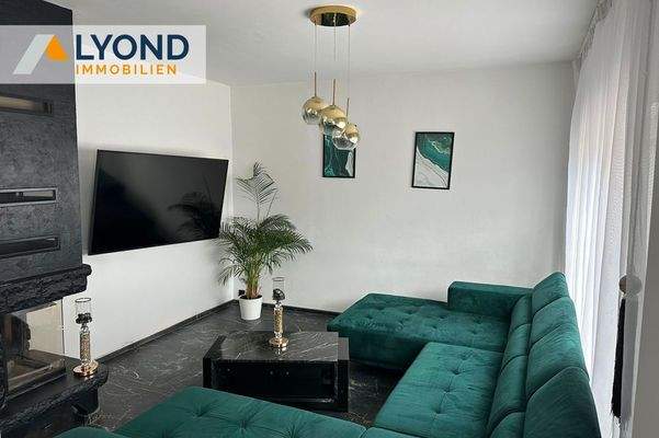 Wohnzimmer mit Kamin