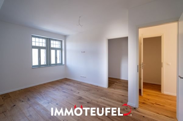 Schlafzimmer mit Ankleidbereich