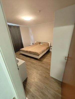 Schlafzimmer mit Doppelbett