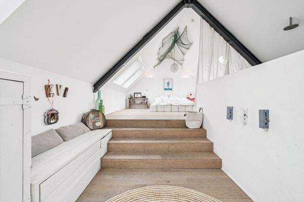 Kinder- oder Gästezimmer im Dachgeschoss