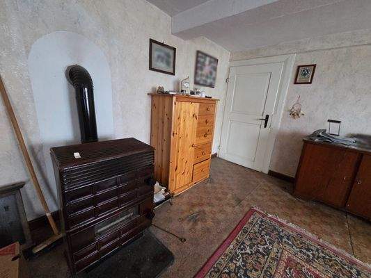 Wohnzimmer im OG mit Ofen