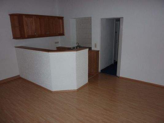 Wohnzimmer mit EBK und Bar