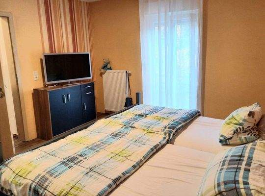 Elternschlafzimmer mit französichem Balkon